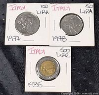 Overview of three Italian coins in holders