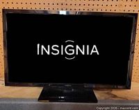 TV powered on displaying Insignia startup logo