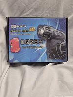 Front of sealed Blitzu Gator 320 headlight/tail light set box
