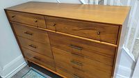 Front view showing drawers and finish
