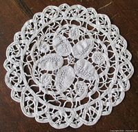 Top view of entire doily showing design and border