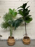 Both faux plants side by side in baskets