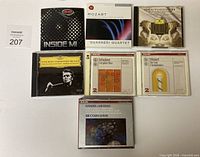 Front view of seven CD cases