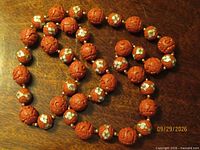 Full view of the necklace laid out showing bead pattern and length