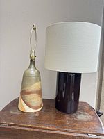 Both lamps side by side showing relative size, colors, presence/absence of shade