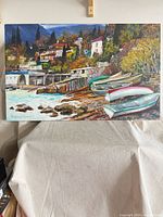 Full view of signed impasto seascape painting on stretcher