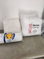 Three pillow inserts: sealed SoftLoft form, sealed Sunburst bolster, loose square insert