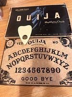 Ouija board, box lid, planchette