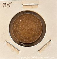 Reverse showing ONE CENT CANADA 1915 within maple leaf wreath