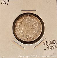 Reverse side showing denomination, date, maple-leaf wreath