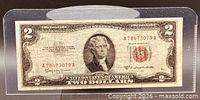 Obverse of the 1953C $2 bill in protective sleeve