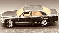Left side view of black Hot Wheels Mercedes-Benz 380 SEL