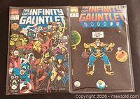 Both Infinity Gauntlet comic books in sleeves, side-by-side view