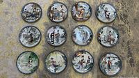 Full set of 12 porcelain plates arranged for overview