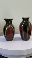 Front view of both vases showing overall shape and glaze colors