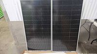 Front view of both solar panels standing upright