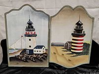 Both wooden lighthouse plaques front view