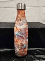 Front view of S'well multicolor galaxy insulated bottle