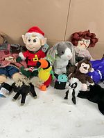 Group of various plush toys and puppets