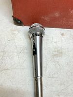 Microphone detail with switch and grille end