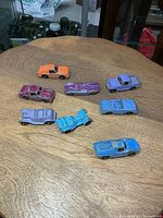 Top view of all eight cars on tabletop