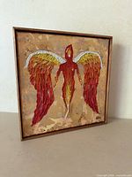 Full view of framed square painting