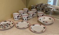 Group view of cups, plates, saucers and bowl