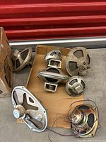 All seven speaker drivers in box and surrounding floor