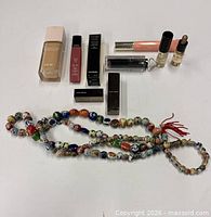 Overview of necklace and cosmetics layout