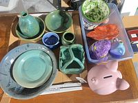 Group view showing piggy bank, bowls, vases, dishes and decorative pieces