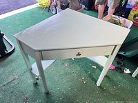 overall view of mint green triangular corner desk