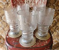 Group shot of five clear LOTR goblets