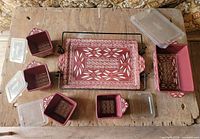 overview of complete Temp-tations ovenware set laid out on table
