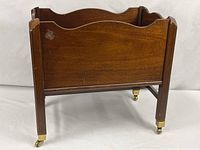 Full view of wooden caddy on casters