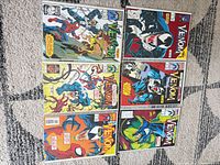 Six bagged Venom: Lethal Protector comics laid out