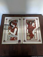 Front view of both framed mirror prints