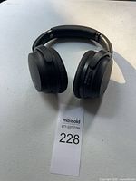 Front view of Samsung black over-ear headphones