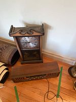 Clock and radio on floor for overall view