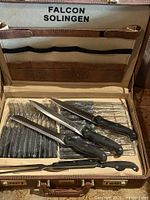 Open briefcase showing entire cutlery set