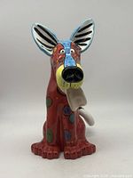 Front view of Ganz Dracos multicolour ceramic dog figurine