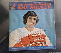 Front cover showing title, player image, apparent signature and wear