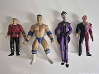 All four action figures side by side