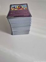 Stack of Pokémon cards showing thickness approximating quantity