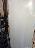 Packaged sliding mirror door panel with foam protectors