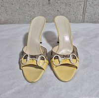 Front view of Gucci sandals showing patent leather toe, horsebit hardware and overall wear