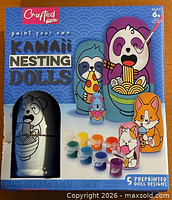 Front of sealed box displaying brand, product name, age rating, contents and paint pots