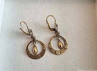 Front view of both earrings showing overall design