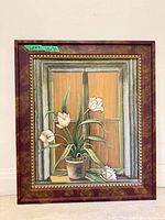 Full view of framed oil painting showing floral subject and entire frame