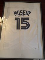 Full view of framed jersey displaying name and number