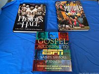 Front covers of the three football books
